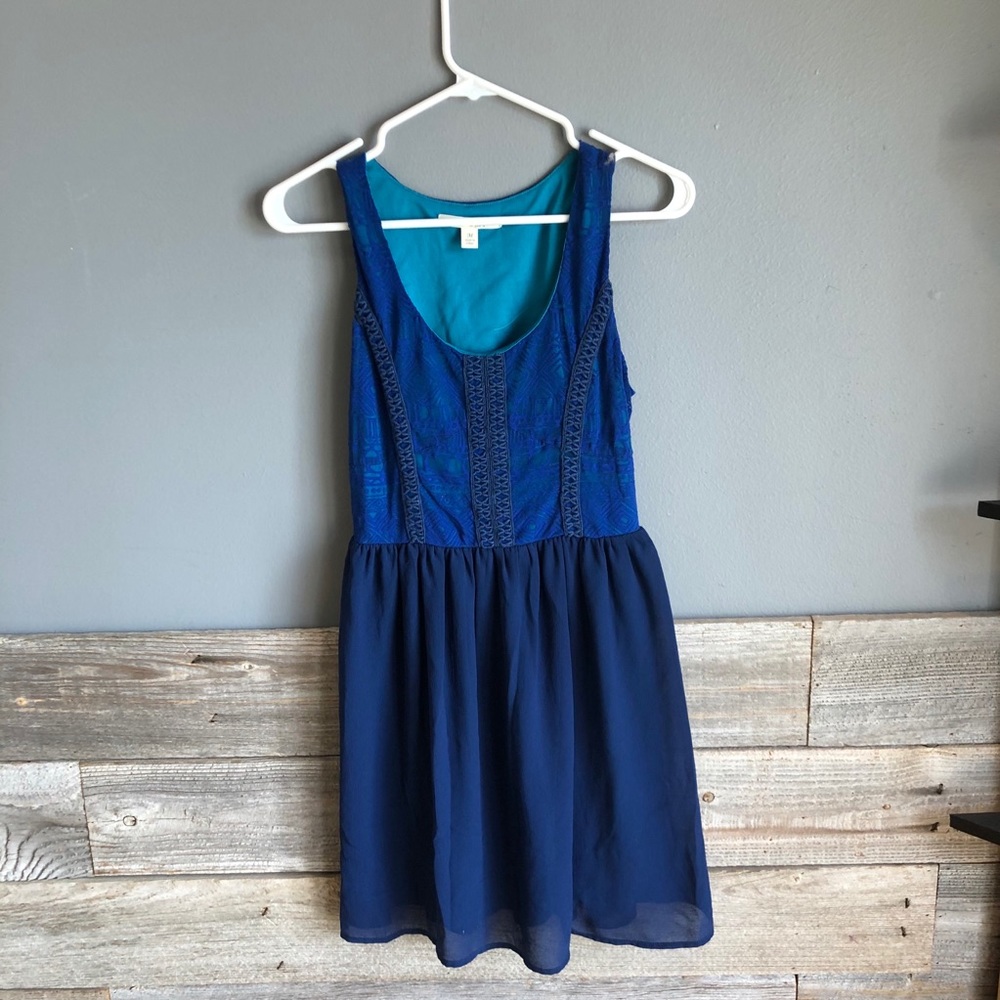 Francesca’s detailed blue dress